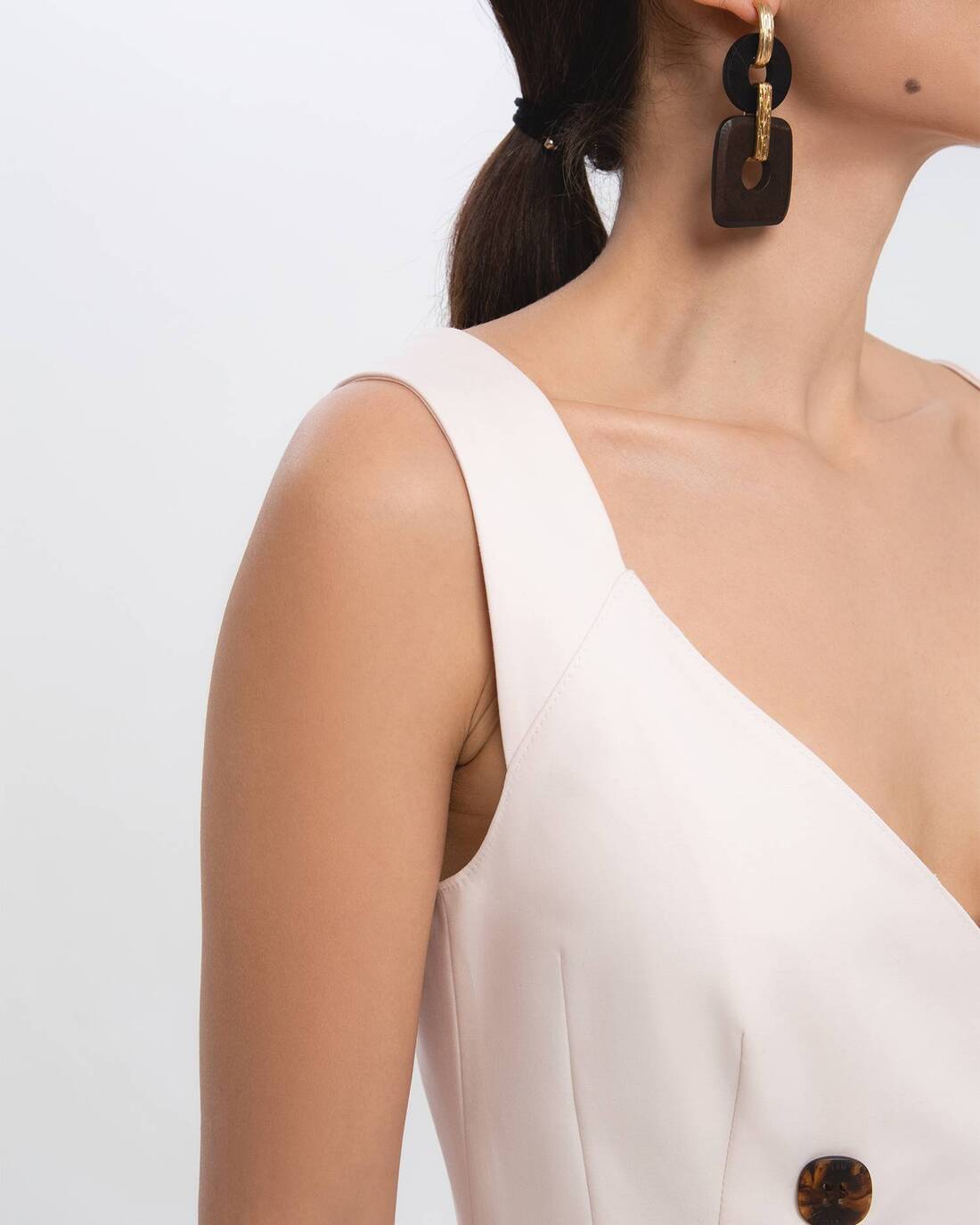 Double-breasted dress with triangular neckline