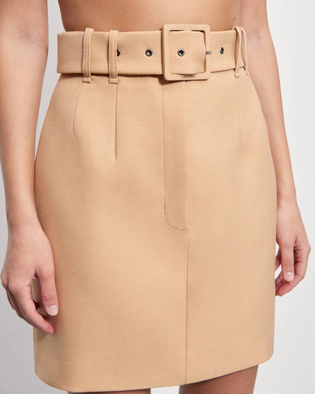 Mini skirt with a square buckle