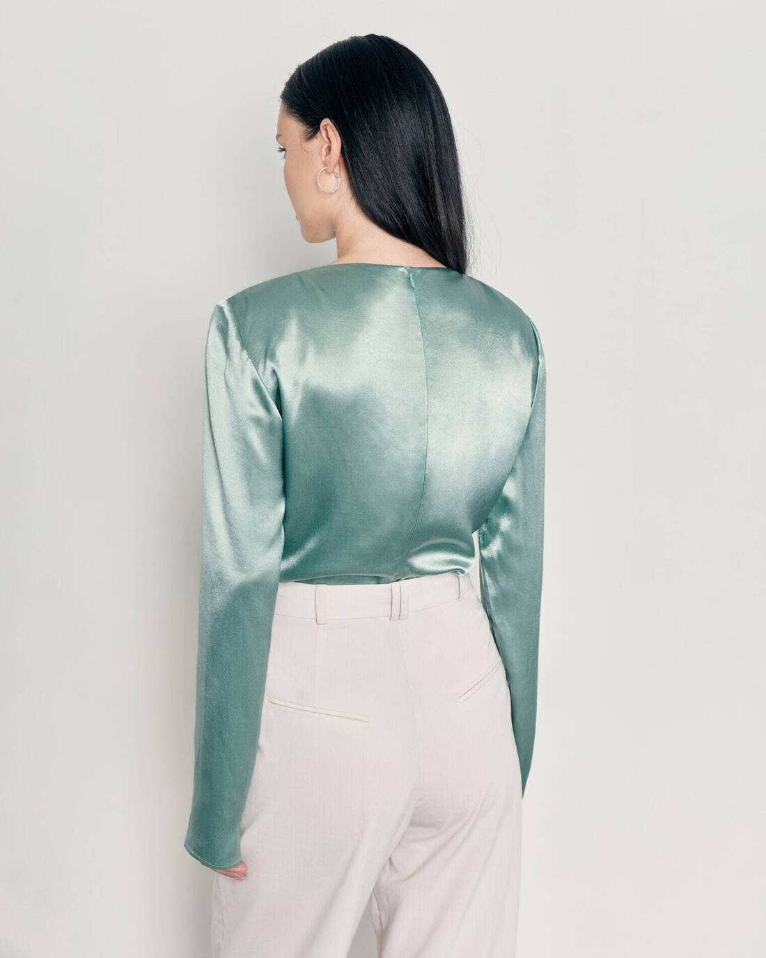 Satin blouse with a decorative knot 