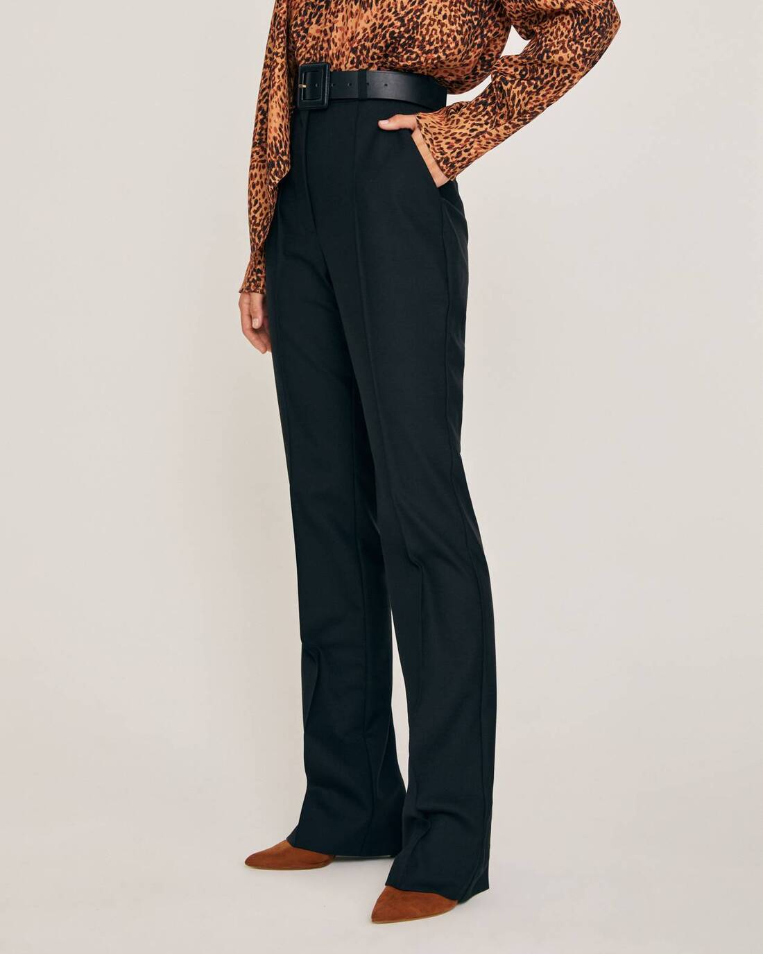 Flared trousers with architectural seams 