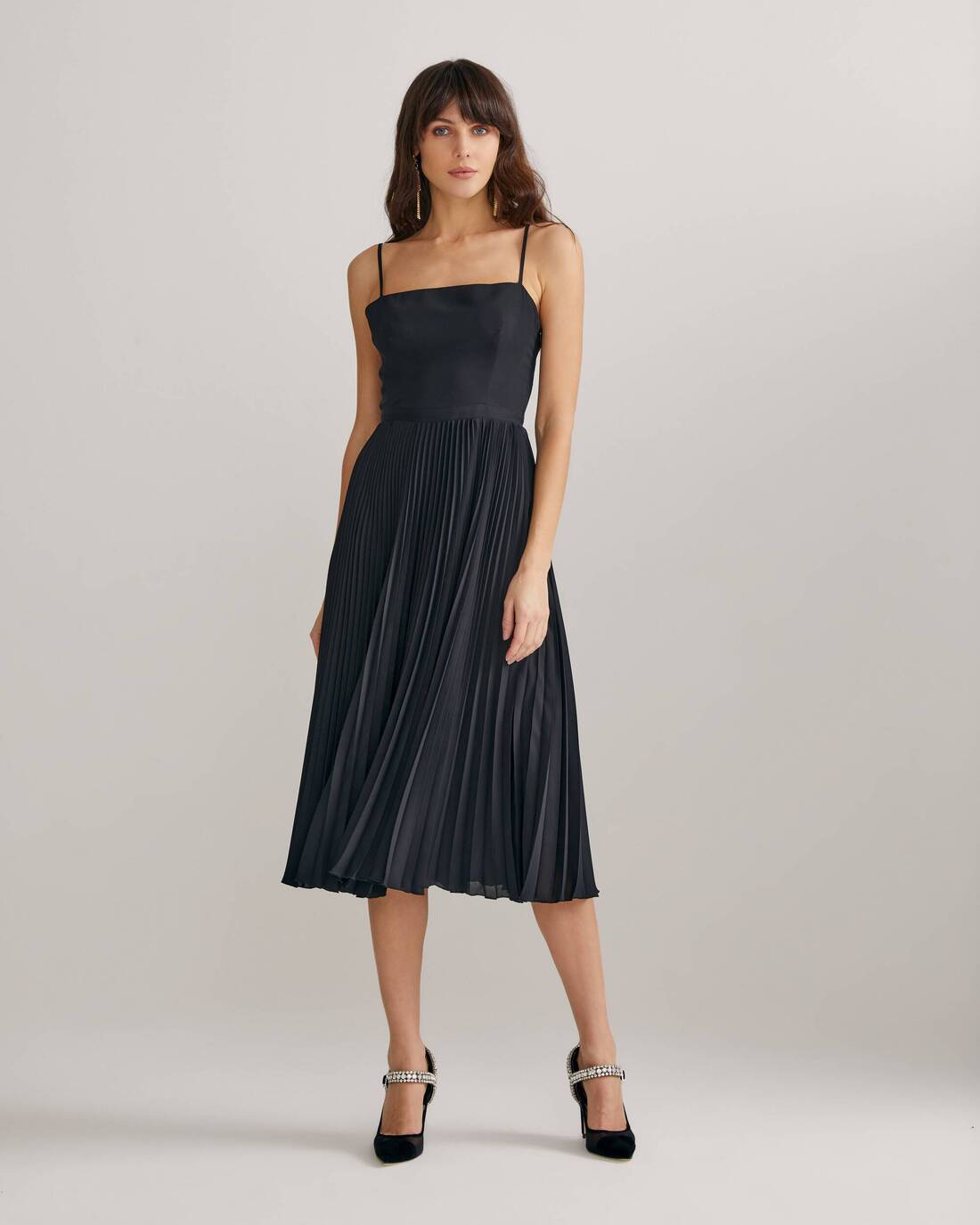 Dress with a pleated skirt