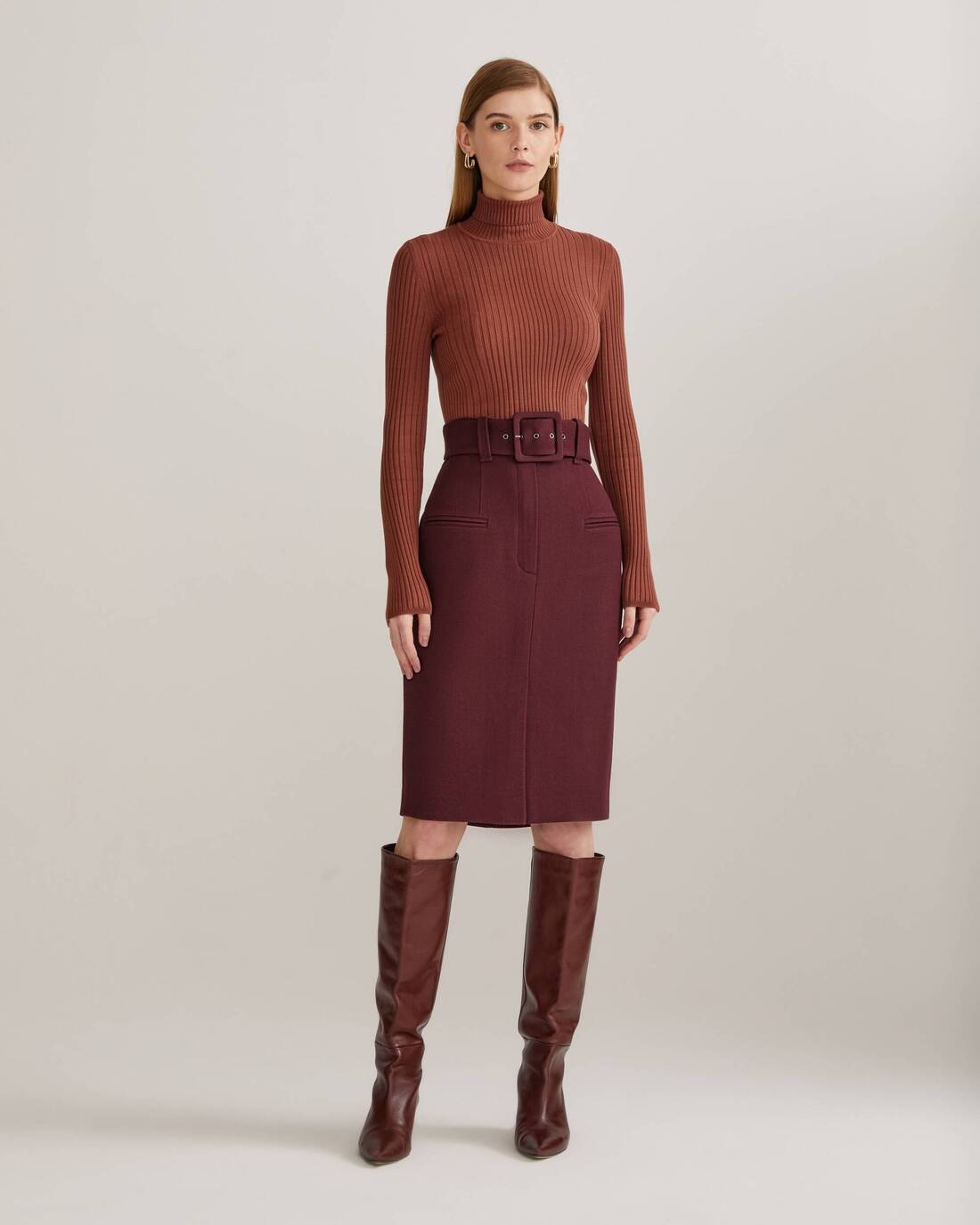 Pencil skirt with a back vent and belt 