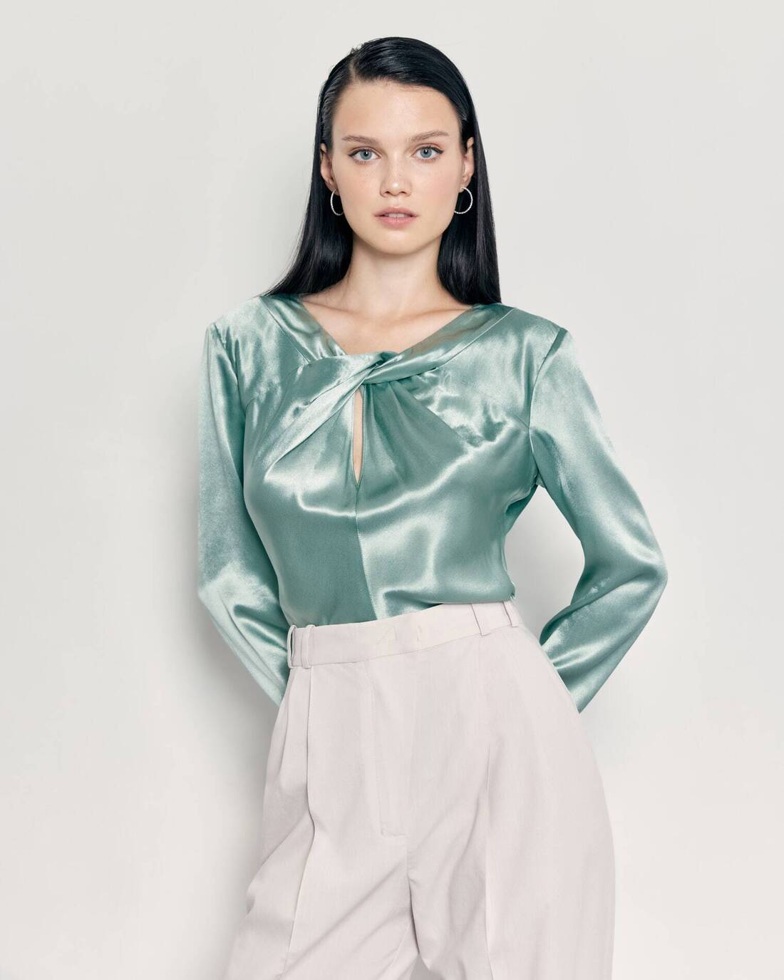 Satin blouse with a decorative knot 