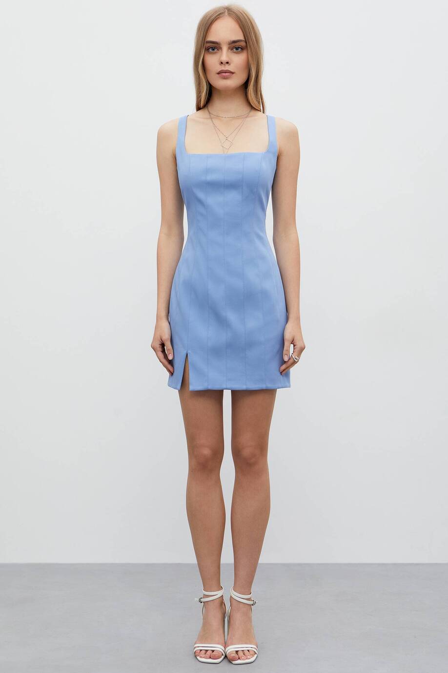 Mini dress with reliefs