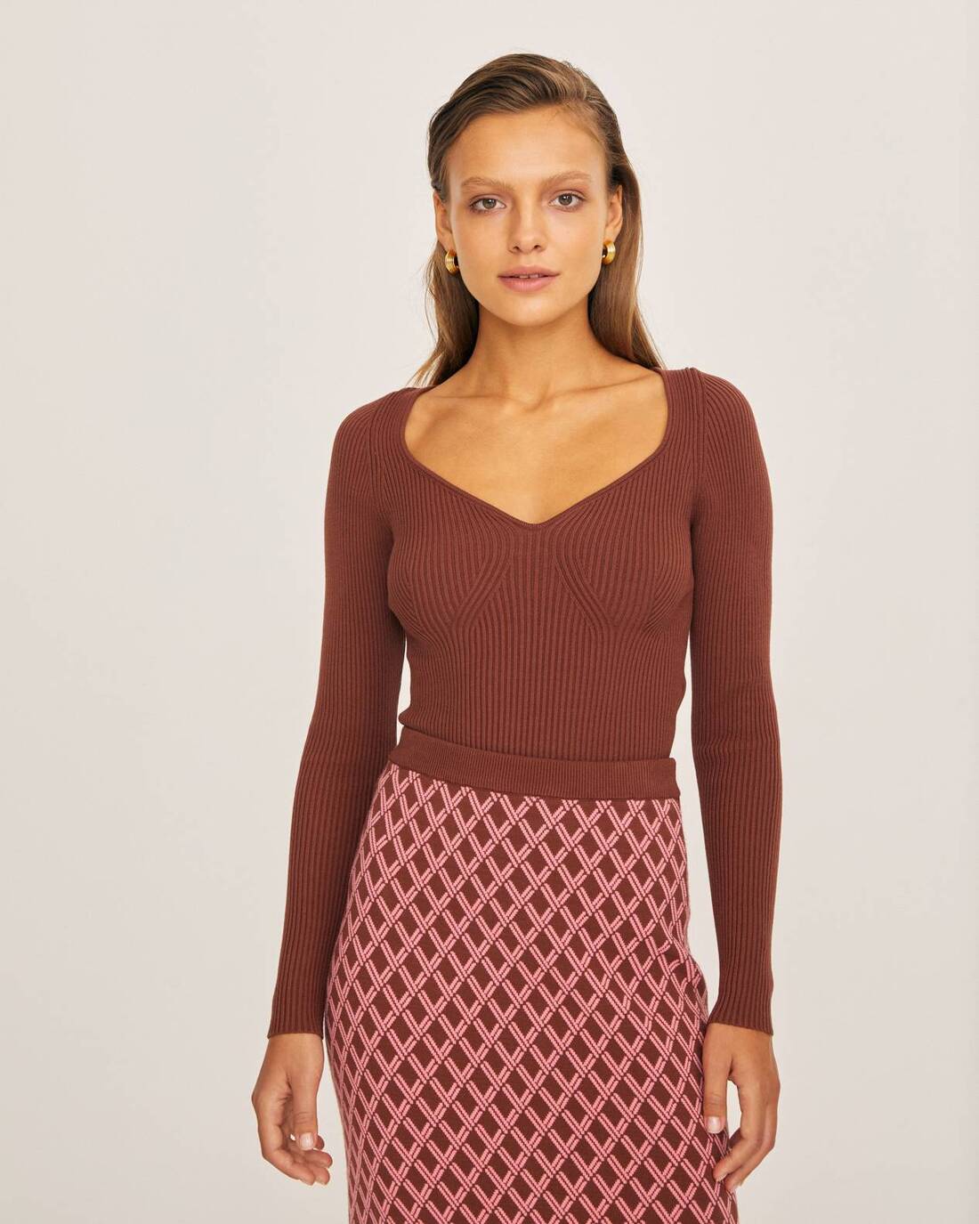 Ribbed sweater with heart neckline