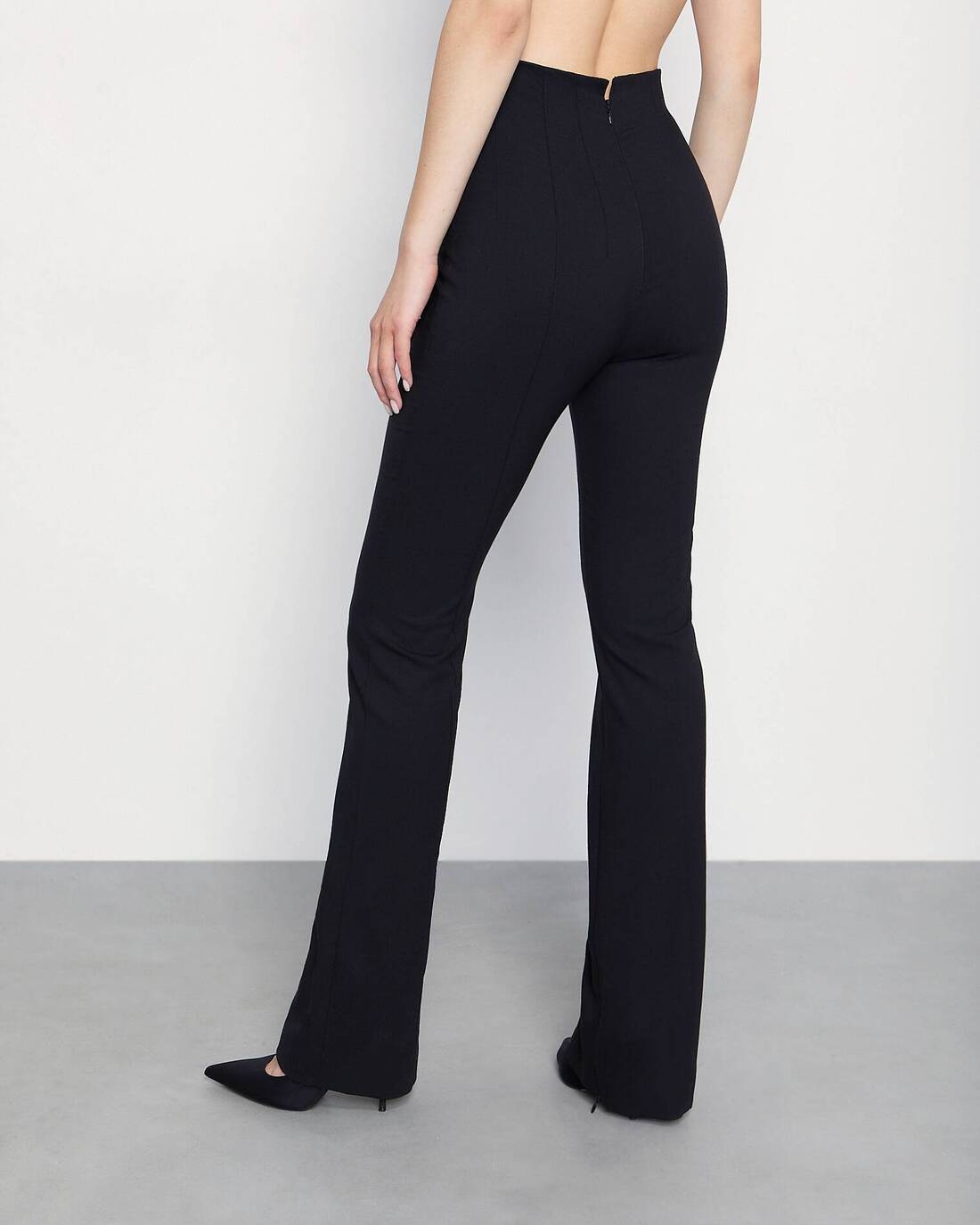 Fitted trousers with slits