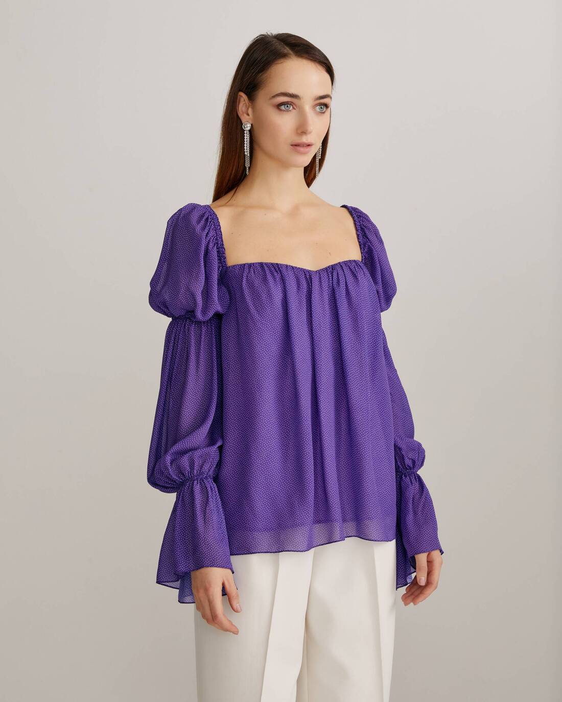 Blouse with ruffles and a polka dot print