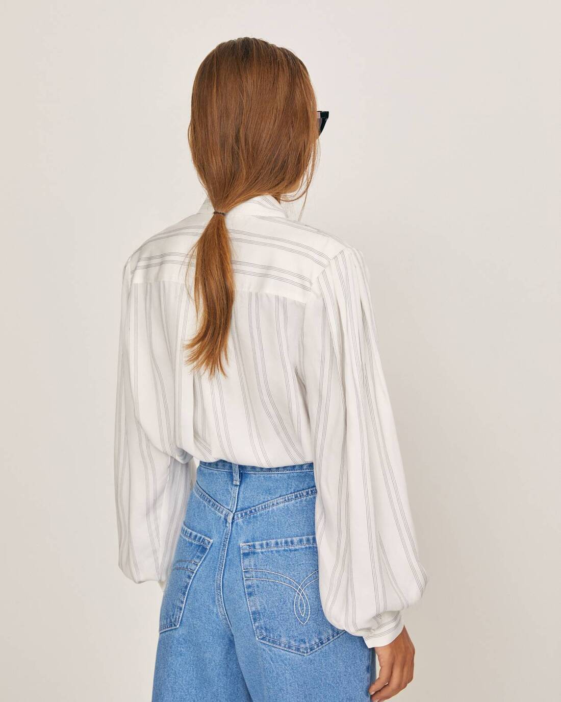 Oversized blouse with accented collar 